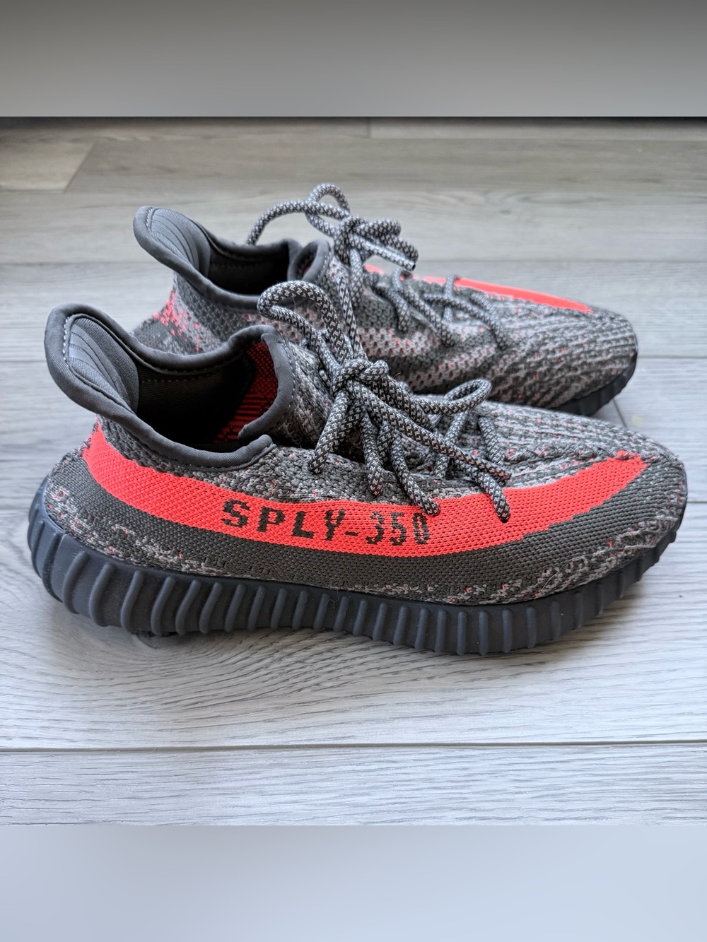 Yeezy Boost 350 V2 Black with Bright Red Stripe